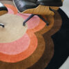 pyöreä matto villamatto retro värikäs geometrinen sisustusstudio Vitriini